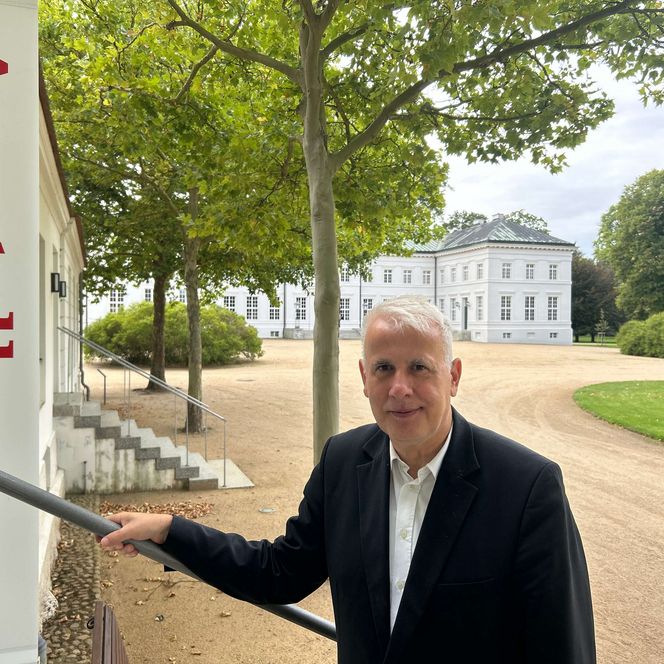 Uwe Rosenberg vorm Stiftungsshop 